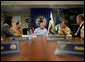 Vice President Dick Cheney attends a classified briefing, Friday, May 11, 2007, aboard the aircraft carrier USS John C. Stennis in the Persian Gulf. Seated with the Vice President from left is U.S. Ambassador to the United Arab Emirates Michele Sison; U.S. naval commander Vice Admiral Kevin J. Cosgriff; USS John C. Stennis Strike Group Commander Rear Admiral Kevin Quinn; Chief of Staff to the Vice President David Addington. White House photo by David Bohrer