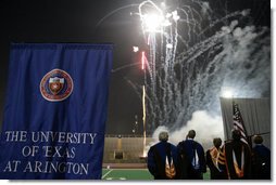 Mrs. Bush, joined by, from left, Dan Formanowicz, Chairman of the Faculty Senate, James Spaniolo, President, UT at Arlington, Robert Estrada, Member, UT System Board of Regents, Dana Dunn, University Provost and Vice President for Academic Affairs, watch fireworks at the conclusion of the 2007 Graduation Celebration event at The University of Texas at Arlington on Friday, May 11, 2007, in Arlington, Texas. During remarks that Mrs. Bush delivered, she said, “ Class of 2007, keep this commitment to others now that you’ve graduated. There are so many people who need your help. Continue your tradition of service to our nation.” White House photo by Shealah Craighead