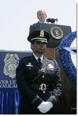 President George W. Bush addresses his remarks at the annual Peace Officers' Memorial Service outside the U.S. Capitol Tuesday, May 15, 2007, paying tribute to law enforcement officers who were killed in the line of duty during the previous year and their families. White House photo by Joyce N. Boghosian