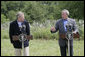 President George W. Bush gestures during a joint press availability Monday, May 21, 2007, with NATO Secretary-General Jaap de Hoop Scheffer at the Bush Ranch in Crawford, Texas. White House photo by Eric Draper