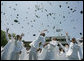 Following President George W. Bush’s address to U.S. Coast Guard Academy graduates Wednesday, May 23, 2007, in New London, Conn., cadets toss their hats into the air. White House photo by Joyce Boghosian