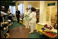 Mrs. Laura Bush speaks to the media during her visit Friday, May 25, 2007, to the Childhelp Children's Advocacy Center in Phoenix. Mrs. Bush commended the work of organizations that serve abused or neglected children, and highlighted the role that caring adults can play in preventing and reporting child abuse. White House photo by Shealah Craighead