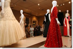 Mrs. Laura Bush looks at The Balenciaga exhibition at the Meadows Museum on Saturday, May 26, 2007, in Dallas. The exhibit features 70 original Balenciaga designs as well as 20 original creations by other designers, including Oscar de la Renta who designed the gown Mrs. Bush wore to the 2005 Inaugural Ball, and has loaned for the exhibition. White House photo by Shealah Craighead