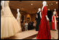 Mrs. Laura Bush looks at The Balenciaga exhibition at the Meadows Museum on Saturday, May 26, 2007, in Dallas. The exhibit features 70 original Balenciaga designs as well as 20 original creations by other designers, including Oscar de la Renta who designed the gown Mrs. Bush wore to the 2005 Inaugural Ball, and has loaned for the exhibition. White House photo by Shealah Craighead