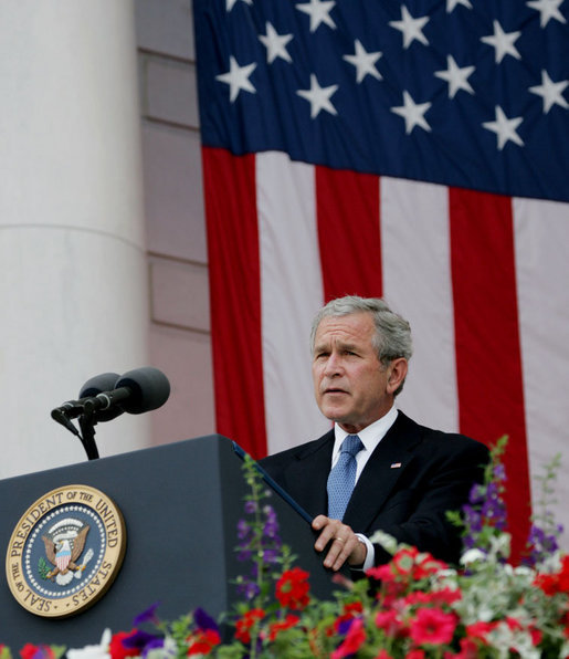 President George W. Bush addresses his remarks at the Memorial Day commemoration ceremony Monday, May 28, 2007, at Arlington National Cemetery in Arlington, Va. Addressing the gathered audience President Bush said, “The greatest memorial to our fallen troops cannot be found in the words we say or the places we gather. The more lasting tribute is all around us—a country where citizens have the right to worship as they want, to march for what they believe, and to say what they think.” White House photo by Chris Greenberg