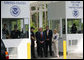 President George W. Bush listens as Ed Cassidy, Assistant Director of U.S. Customs and Border Protection, explains the procedures at a simulated border crossing during in a tour Tuesday, May 29, 2007, of the Federal Law Enforcement Training Center in Glynco, Ga. The President spent the day in Georgia where he was briefed on wildfires and also delivered remarks on comprehensive immigration reform.  White House photo by Eric Draper