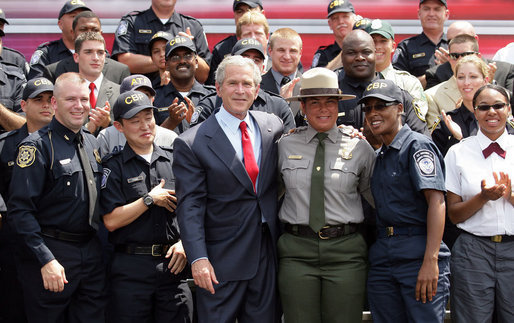 President George W. Bush poses with staff and students of the Federal Law Enforcement Training Center Tuesday, May 29, 2007, in Glynco, Ga. The President toured the facility and delivered remarks on immigration reform before returning to Washington, D.C. White House photo by Eric Draper