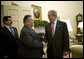 President George W. Bush welcomes President Jalal Talabani of Iraq to the Oval Office Thursday, May 31, 2007. White House photo by Eric Draper