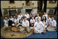 Mrs. Laura Bush meets with the 15 Scripps National Spelling Bee Championship finalists during an ABC television taping at the White House Thursday, May 31, 2007, to be aired on ABC during the final round Thursday evening. From left to right are Tia Natasha-Elizabeth Thomas of Coarsegold, Calif.; Isabel A. Jacobson of Madison, Wis.; Joseph Henares of Avon, Conn.; Cody Wang of Alberta, Canada; Nithya P. Vijayakumar of Canton, Mich.; Kavya Shivashankar of Olathe, Kansas; Prateek Kohli of Westbury, N.Y.; Jonathan Horton, front-left center, of Gilbert, Ariz.; Evan M. O'Dorney, center, of Danville, Calif.; Connor W. Spencer, front-right center,of Platte City, Mo.; Amy Chyao, back-row next to Mrs. Bush, of Richardson, Texas; Claire Zhang of Jupiter, Fla.; Anqi Dong, upper-right, of Saskatoon, Saskatchewan, Canada; Nate Gartke , center far-right, of Spruce Grove, Alberta, Canada; and Matthew Evans, far-right, of Albuquerque, N.Mex. White House photo by Shealah Craighead