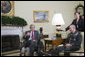 President George W. Bush meets with Lt. Gen. Martin E. Dempsey, former Commanding General of Multi-National Security and Transition Command - Iraq, in the Oval Office Thursday, June 14, 2007. The President thanked the general for his leadership saying, "It's an extraordinary country where people volunteer to go into combat zones, to protect the security of the United States of America. And we appreciate you, and thank you, and wish you all the best in your next assignment." White House photo by Joyce N. Boghosian