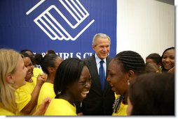 President George W. Bush is surrounded by kids at the Boys and Girls Club of South Central Kansas - 21st Street during his stop Friday, June 15, 2007, in Wichita. Said the President, "I think it's very important for the people of Wichita to support a program such as this -- after all, we can change our country one heart and one soul at a time. And I'm really pleased to be here."  White House photo by Eric Draper