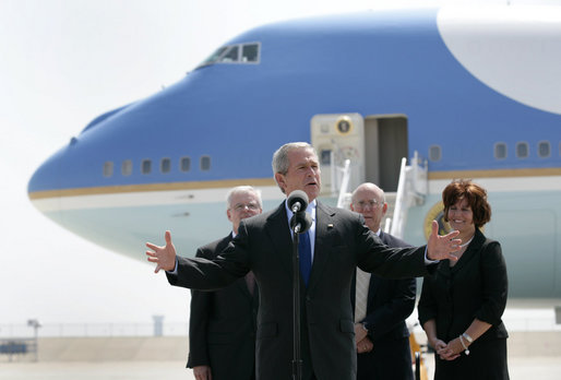 President George W. Bush speaks to Boeing employees and base personnel and families at McConnell Air Force Base in Wichita Friday, June 15, 2007. With him, from left are: Pat Finneran, Senator Pat Roberts (R-Kansas), Vicki Tiahrt, spouse of Kansas Congressman Todd Tiarht. White House photo by Eric Draper