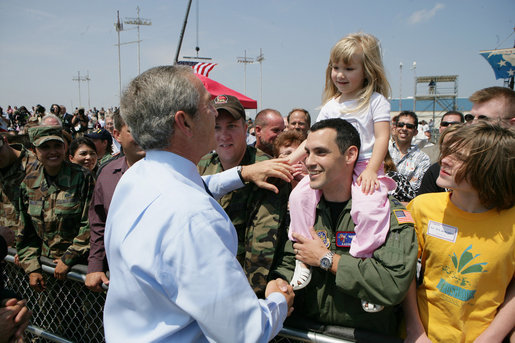 President George W. Bush greets Boeing employees and military base personnel and families after arriving Friday, June 15, 2007, at McConnell Air Force Base in Wichita. More than 1500 people were on hand to greet the President, who told them, " I'm honored to be here with Senator Pat Roberts and Vicki Tiahrt. They're strong supporters of the programs here, strong supporters of Boeing. I appreciate you coming out to say hello." White House photo by Eric Draper