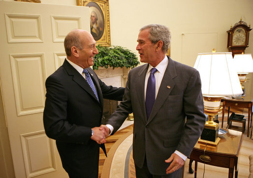 President George W. Bush welcomes Prime Minister Ehud Olmert of Israel to the Oval Office Tuesday, June 19, 2007. White House photo by Eric Draper