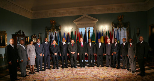 President George W. Bush poses for a photo with the Caribbean Heads of Government Wednesday, June 20, 2007, prior to their meeting at the State Department in Washington, D.C. From left to right are: Prime Minister Patrick Manning of Trinidad and Tobago; Acting Prime Minister Stephenson King of Saint Lucia; Prime Minister Portia Simpson Miller of Jamaica; President Bharrat Jagdeo of Guyana; Prime Minister Roosevelt Skerrit of Dominica; Prime Minister Owen S. Arthur of Barbados; Prime Minister Baldwin Spencer of Antigua and Barbuda; Prime Minister Ralph Gonsalves of St. Vincent and the Grenadines; Edwin Carrington, Secretary-General of CARICOM; Prime Minister Hubert A. Ingraham of The Bahamas; Prime Minister Said Musa of Belize; Prime Minister Keith D. Mitchell of Grenada; President Rene Preval of Haiti; Prime Minister Denzil L. Douglas of St. Kitts and Nevis; and Suriname Vice President Ramdien Sardjoe. White House photo by Debra Gulbas