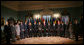 President George W. Bush poses for a photo with the Caribbean Heads of Government Wednesday, June 20, 2007, prior to their meeting at the State Department in Washington, D.C. From left to right are: Prime Minister Patrick Manning of Trinidad and Tobago; Acting Prime Minister Stephenson King of Saint Lucia; Prime Minister Portia Simpson Miller of Jamaica; President Bharrat Jagdeo of Guyana; Prime Minister Roosevelt Skerrit of Dominica; Prime Minister Owen S. Arthur of Barbados; Prime Minister Baldwin Spencer of Antigua and Barbuda; Prime Minister Ralph Gonsalves of St. Vincent and the Grenadines; Edwin Carrington, Secretary-General of CARICOM; Prime Minister Hubert A. Ingraham of The Bahamas; Prime Minister Said Musa of Belize; Prime Minister Keith D. Mitchell of Grenada; President Rene Preval of Haiti; Prime Minister Denzil L. Douglas of St. Kitts and Nevis; and Suriname Vice President Ramdien Sardjoe. White House photo by Debra Gulbas