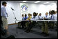 Mrs. Laura Bush listens to Team Focus class participants Thursday, June 21, 2007, in Mobile, Ala., share their personal stories in the “Yesterday, Today, Tomorrow” class during a visit to Team Focus’s National Leadership Camp, as part of Helping America’s Youth initiative. To fatherless young men, Team Focus offers mentoring services such as summer academic programs, leadership camps, year-round mentoring and scholarships and college counseling. White House photo by Shealah Craighead