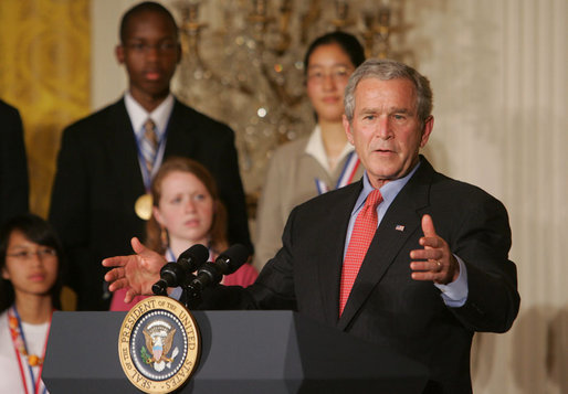 President George W. Bush gestures as he congratulates the 2007 Presidential Scholars Monday, June 25, 2007 in the East Room of the White House, and highlights the need to reauthorize the No Child Left Behind Act this year. White House photo by Joyce N. Boghosian