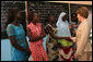 Mrs. Laura Bush meets Ambassador Girls' scholarship winners during a visit to Grand Medine Primary School Tuesday, June 26, 2007, in Dakar, Senegal. President Bush's Africa Education Initiative is working to provide 550,000 scholarships to girls throughout Africa by 2010. Pictured are, from left: Khady Diome, 15, of Diohine, Senegal; Fatou Djiby, 15, of Diakhao, Senegal; Christine Ndiaye, 14, of Diakhao, Senegal; Yamama Diop, 15, of Maroneme, Senegal; and Nango Dang, 16, of Thicky Serere, Senegal. White House photo by Shealah Craighead