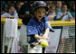 The tongue is out as the swing is swung during an at bats for a Bobcat from Cumberland, Maryland Wednesday, June 27, 2007, against the Luray, Virginia Red Wings on the South Lawn. The game marked the opening of the 2007 White House Tee Ball season. White House photo by Eric Draper