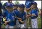 Members of the Cumberland, Maryland Bobcats look on during the presentation of game balls Wednesday, June 27, 2007, after their opening game of the 2007 White House Tee Ball season against the Luray, Virginia Red Wings on the South Lawn. White House photo by Chris Greenberg