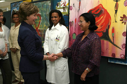 Mrs. Laura Bush is greeted by Dr. Orlando Albuquerque, Director of Pediatric Services, at Maputo Central Pediatric Day Hospital Wednesday, June 27, 2007, in Maputo, Mozambique. The Pediatric Day Hospital was opened in 2004 with assistance from the French government and UNICEF, and is supported in part through the President's Emergency Plan for AIDS Relief. White House photo by Shealah Craighead