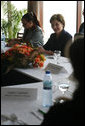 Mrs. Laura Bush meets with local women community leaders for a roundtable discussion Wednesday, June 27, 2007, in Maputo, Mozambique. During their talk about women's empowerment, domestic violence, and HIV/AIDS, Mrs. Bush underlined the administration's commitment to women's rights in Africa. White House photo by Shealah Craighead