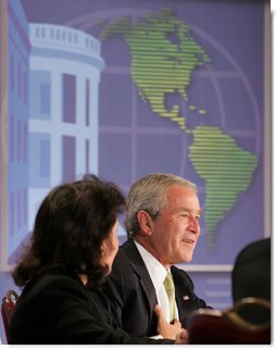 President George W. Bush makes remarks Monday, July 9, 2007, during A Conversation on the Americas at the Hyatt Regency Crystal City in Arlington, Va. The purpose of the gathering was to highlight extensive society-to-society relationships between the U.S. and its neighbors and to further promote the theme of how the United States helps its neighbors promote education, health care and economic opportunity at all levels. White House photo by Chris Greenberg