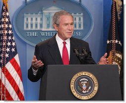 Following an official ribbon cutting President George W. Bush welcomes reporters and photographers back to the newly re-modeled James S. Brady Press Briefing Room, Wednesday, July 11, 2007, at the White House. White House photo by Chris Greenberg