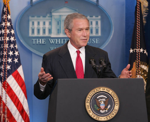 Following an official ribbon cutting President George W. Bush welcomes reporters and photographers back to the newly re-modeled James S. Brady Press Briefing Room, Wednesday, July 11, 2007, at the White House. White House photo by Chris Greenberg