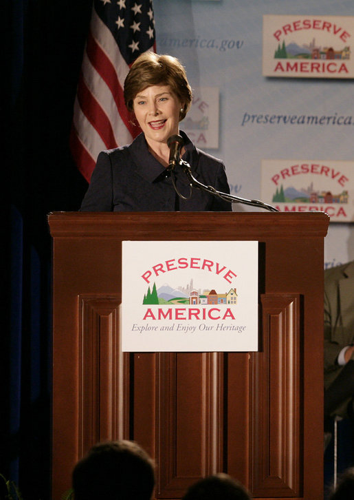 Mrs. Laura Bush addresses her remarks at the Preserve America grants presentation Thursday, July 12, 2007, at the Cannon House Office Building at the U.S. Capitol in Washington, D.C., honoring communities that use their historic assets to educate visitors and local residents about their town's important links to our nation's past. Mrs. Bush also took the occassion to honor the memory of former First Lady Lady Bird Johnson, remembered for her love of America's environment and history. White House photo by Shealah Craighead