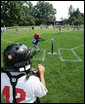 The game is on between the Inner City Little League of Brooklyn, N.Y. and the Wrigley Little League Dodgers of Los Angeles, all wearing the number 42 in honor of Hall of Fame player Jackie Robinson, at the White House Tee Ball Game on the South Lawn of the White House Sunday, July 15, 2007. Brooklyn and Los Angeles represent the two home cities of Robinson's team. More about Tee Ball on the South Lawn. White House photo by Chris Greenberg