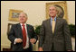 President George W. Bush and Polish President Lech Kaczynski conclude their meeting in the Oval Office Monday, July 16, 2007, where the two leaders met to discuss economic and mutual security issues. White House photo by Joyce N. Boghosian