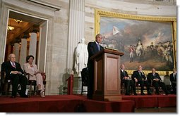 President George W. Bush delivers remarks during the Congressional Gold Medal Ceremony honoring Dr. Norman Bourlag Tuesday, July 17 , 2007, at the U.S. Capitol. "Many have highlighted Norman Borlaug's achievements in turning ordinary staples such as wheat and rice into miracles that brought hope to millions," said President Bush of Dr. Bourlag who has received the Nobel Peace Prize and the Presidential Medal of Freedom. White House photo by Chris Greenberg