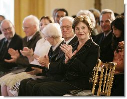 Mrs. Laura Bush, seated next to design award recipient Robert Venturi, applauds the winners of the 2007 Cooper-Hewitt National Design Awards Wednesday, July 18, 2007, in the East Room of the White House. White House photo by Shealah Craighead