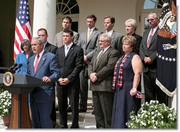 President George W. Bush, joined by veterans and military families, discusses the Global War on Terror in the Rose Garden Friday, July 20, 2007. During his statement, the President quoted Air Force Reservist Eric Egland saying, "We live in the world's oldest democracy and have been blessed with the strength to protect our freedoms and to help others who seek the same." White House photo by David Jolkovski