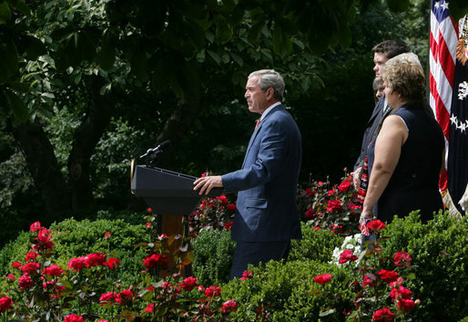 Standing with veterans and military family members, President George W. Bush delivers remarks on the Global War on Terror Friday, July 20, 2007, in the Rose Garden. "When Congress returns after Labor Day, there will be less than one month before the fiscal year ends and current funds for Defense Department operations run out," said the President. "Congress still has an opportunity to do right by our men and women in uniform -- and our national security. So today I call on Congress to take action and get this vital piece of legislation to me to sign -- on budget and on time." White House photo by Joyce N. Boghosian