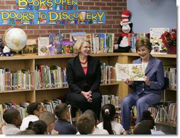 Mrs. Laura Bush, joined by U.S. Secretary of Education Margaret Spellings, reads to children at the Driggs School in Waterbury, Conn., Tuesday, July 24, 2007. Mrs. Bush also announced the 2007 Improving Literacy through School Libraries grants being awarded by the U.S. Department of Education. White House photo by Shealah Craighead