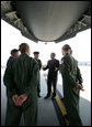 President George W. Bush meets with military personnel prior to boarding a C-17 aircraft to watch cargo loading operations Tuesday, July 24, 2007, during a visit to Charleston AFB in Charleston, S.C. White House photo by Eric Draper