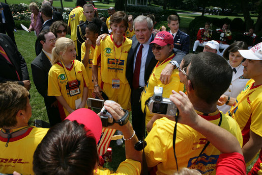 President George W. Bush talks with Special Olympic Team USA athletes after a Special Olympics Global Law Enforcement Torch Run Ceremony Thursday, July 26, 2007, in the Rose Garden. White House photo by Eric Draper