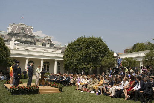 Mrs. Laura Bush speaks during a Special Olympics Global Law Enforcement Torch Run Ceremony Thursday, July 26, 2007, in the Rose Garden. "Those first games in Chicago drew a thousand athletes from 26 United States states and Canada," said Mrs. Bush. "Today, the Special Olympics has grown into a global movement of 2.5 million athletes, representing 165 nations." White House photo by Shealah Craighead