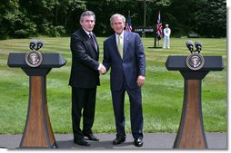 President George W. Bush and British Prime Minister Gordon Brown stand together during their joint press availability Monday, July 30, 2007, at Camp David near Thurmont, Md. "So everybody is wondering whether or not the Prime Minister and I were able to find common ground, to get along, to have a meaningful discussion. And the answer is, absolutely," said President Bush. White House photo by Chris Greenberg