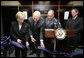 Vice President Dick Cheney and Mrs. Lynne Cheney cut the ceremonial ribbon, Monday, July 30, 2007, to inaugurate the Richard B. and Lynne V. Cheney Cardiovascular Institute at The George Washington University in Washington, D.C. The Institute's mission is to promote clinical research, education, patient care and community service with the goal of accelerating the pace of scientific discovery, reducing mortality and improving the quality of life of Americans with cardiovascular disease. White House photo by David Bohrer