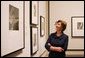 Mrs. Laura Bush views photographs Wednesday, Aug. 1, 2007, during her visit to the National Gallery of Art exhibit, FOTO: Modernity in Central Europe, 1918-1945. Mrs. Bush toured the exhibit with Mrs. Náda P. Simonyi, wife of Hungarian Ambassador András Simonyi. White House photo by Joyce N. Boghosian