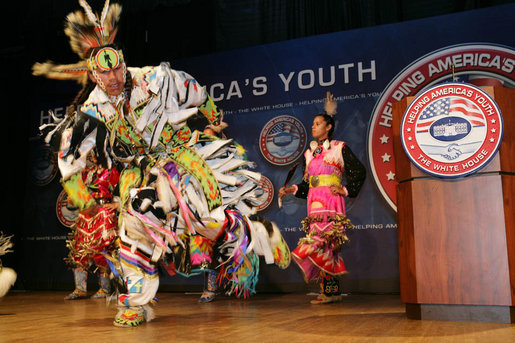 Members of the Three Affiliated Tribes Youth Dance Troupe perform at the Helping America's Youth Fourth Regional Conference in St. Paul, Minn., Friday, August 3, 2007. The dancers, ranging in age from 10 to eighteen, showcased six styles of Plains Powwow Dancing. Each style of dance represents a specific history and tells a story of American Indian culture. A segment of the conference addressed the unique challenges facing tribal youth. White House photo by Chris Greenberg