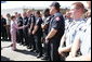 Mrs. Laura Bush greets members of Minnesota Task Force 1-Urban Search and Rescue and other first responders at an Emergency Operation Command Center at the site of the I-35W bridge collapse in Minneapolis, Friday, Aug. 3, 2007. White House photo by Chris Greenberg