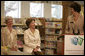 Mrs. Laura Bush is introduced by Texas Comptroller Susan Combs during a visit Tuesday, August 14, 2007, to the Westbank Community Library in Austin, where the construction of the Laura Bush Community Library was announced. The library will be the first public library in the United States to be named for Mrs. Bush, a former teacher and librarian. Joining them is Beth Fox, head librarian at the Westbank library. White House photo by Shealah Craighead