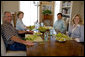 President George W. Bush and Mrs. Laura Bush sit with U.S. Attorney General Alberto Gonzales and his wife, Rebecca, during a visit Sunday, Aug. 26, 2007, at the Bush Ranch in Crawford, Texas. The Attorney General's resignation was announced Monday morning. In a statement, the President said, "Al Gonzales is a man of integrity, decency and principle. And I have reluctantly accepted his resignation, with great appreciation for the service that he has provided for our country." White House photo by Chris Greenberg