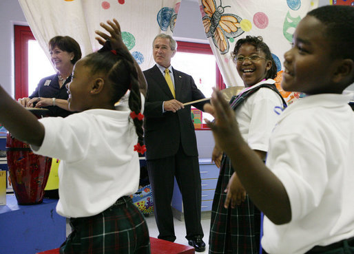 President George W. Bush and Louisiana Governor Kathleen Blanco, left, play musical instruments during a children's program at the Dr. Martin Luther King Jr. Charter School for Science and Technology, Wednesday, Aug. 29, 2007, in New Orleans. White House photo by Chris Greenberg