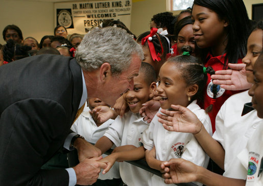 President George W. Bush greets students at the Dr. Martin Luther King Jr. Charter School for Science and Technology Wednesday, Aug. 29, 2007, in New Orleans. White House photo by Chris Greenberg